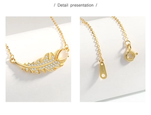 Detail of s925 silver leaf necklace with cat eye stone and sparkling zircon pavé