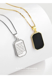 Detail of S925 sterling silver square pendant with black agate and engraved quote