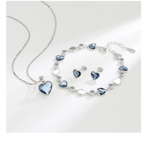 Detail of S925 sterling silver stamp on the heart jewelry set with blue crystals