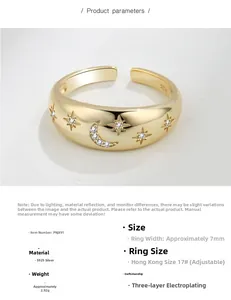 Detail of S925 sterling silver ring featuring star and moon engravings with zircon stones