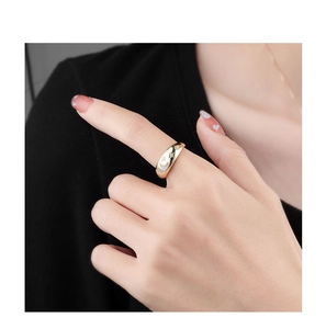 Macro view of vintage gold ring featuring celestial moon and star relief details