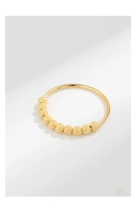Detail of S925 sterling silver spinning ring with ten frosted gold movable beads
