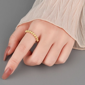 Minimalist S925 sterling silver frosted beaded spinning ring in golden finish for women