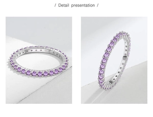 Detailansicht eines S925 Sterlingsilber-Eternity-Rings mit lila Edelsteinen besetzt