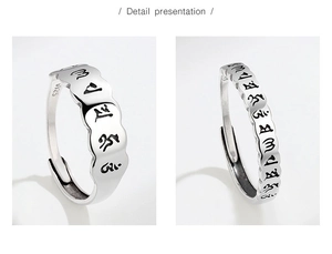 Macro detail of S925 sterling silver ring with engraved Heart Sutra and vintage finish