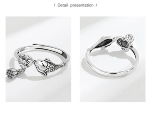 Detailed macro view of S925 sterling silver koi fish and lotus ring with tassel pendant