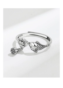 Detail of S925 silver koi fish and lotus ring with a delicate hanging lotus seed pod