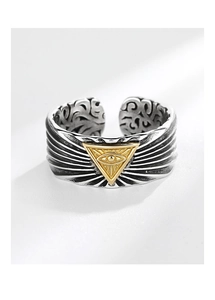 Detailed macro view of vintage silver eye of providence ring with adjustable open band