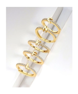 Detail of S925 sterling silver rings with micro-paved letter charms and S925 hallmark