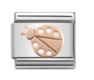 Close-up of a stainless steel DIY link charm with a rose gold ladybug inlay detail