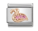 Close-up of a dodo charm link with pink crystals on a stainless steel modular bracelet