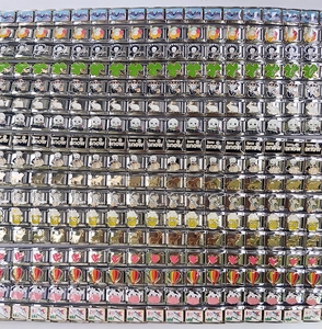 Detailed grid showing colorful Italian charm links with enamel icons and patterns