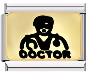 Macro shot of stainless steel Italian charm featuring a gold doctor silhouette and text