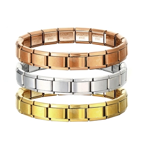 Detail of Italian Charm Bracelet showing stainless steel engraving in rose gold, silver and gold