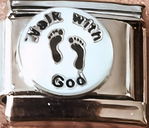 Macro detail of Italian Charm with 'Walk With God' text and black footprints icon