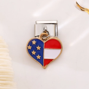 Macro detail of a heart-shaped Italian charm with red white blue enamel and gold stars