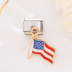 Detail of Italian charm with American flag pendant on polished stainless steel base