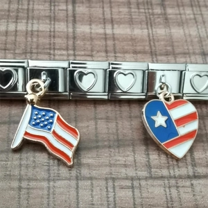 Detailed view of Italian charm bracelet with USA flag and heart Puerto Rico flag enamel charms