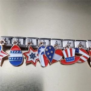 Detail of Italian link bracelet charms featuring American Independence Day enamel designs