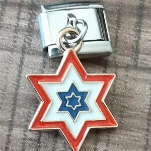 Close-up of a modular Italian charm link featuring a red, white, and blue Star of David