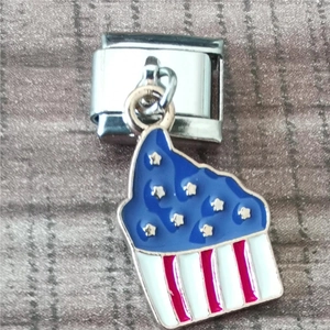 Macro detail of Italian cupcake charm with American flag motif for modular bracelet