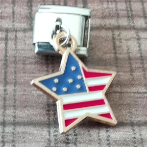 Macro shot of Italian charm link featuring American flag enamel star and steel modular buckle