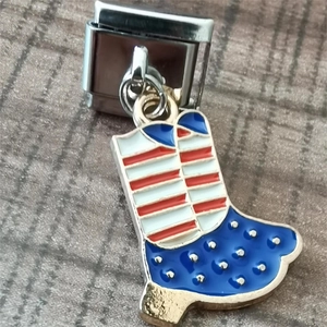 Detail of Italian charm link featuring American flag cowboy boot in colorful enamel