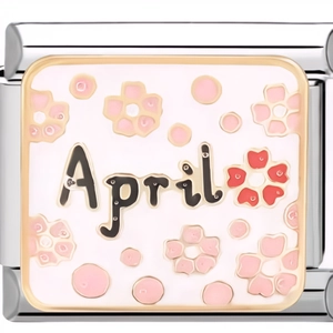 Macro view of a 9mm Italian charm link with April text and pink floral pattern