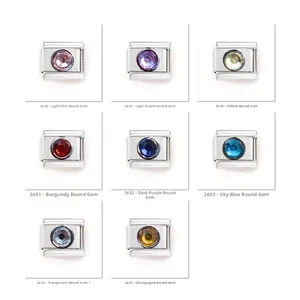 Detailed view of stainless steel charm links with multifaceted colorful gemstones