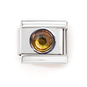Detail of Italian style stainless steel link with multifaceted yellow gemstone inlay