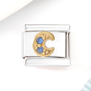 Italian modular charm bracelet link featuring a golden crescent moon and blue zircons