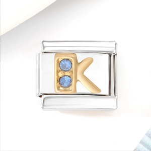 Italian charm bracelet module in stainless steel with golden letter K and blue zircon