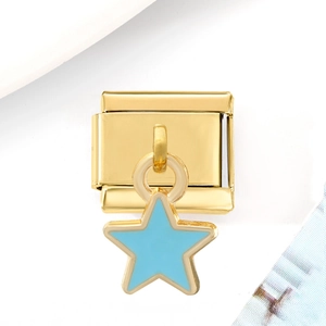Detail of Italian charm link in gold with a light blue enamel star pendant for DIY jewelry
