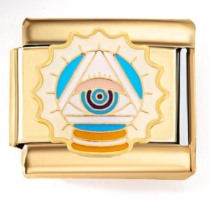 Macro shot of Italian gold charm with enamel Eye of Providence and sunburst detail