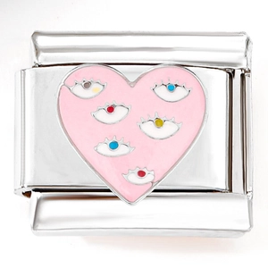 Macro detail of Italian charm bracelet link with pink heart and colorful eye motifs