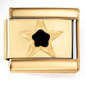 Macro detail of 18K gold stainless steel charm featuring a black enamel star center