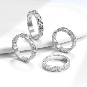 Minimalist S925 sterling silver rings with crushed ice texture in a set of four