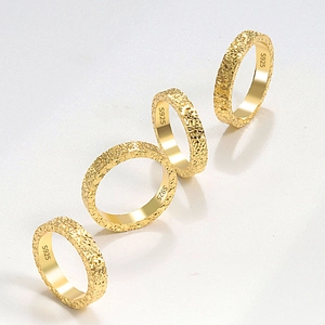 Set of four minimalist S925 sterling silver gold plated rings with hammered texture design