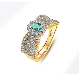 Detail of S925 hallmark on gold plated lace ring with emerald and adjustable band