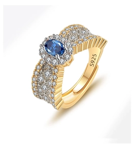 Close-up of S925 sterling silver ring featuring a blue oval gemstone with lace gold band