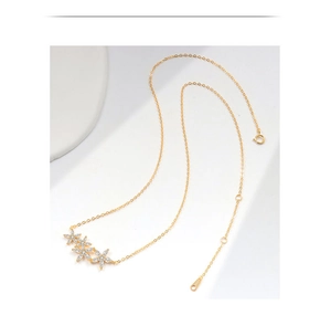 Close-up of S925 sterling silver flower necklace with 18k gold plating and marquise zircon