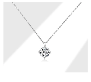 Macro detail of a 925 sterling silver necklace featuring a four-prong set sparkling cubic zirconia
