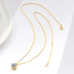 Elegant S925 sterling silver gold necklace featuring a sparkling round solitaire pendant