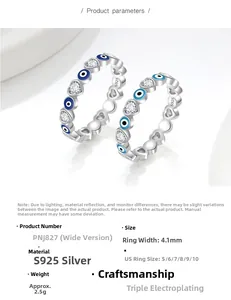 Macro detail of S925 sterling silver evil eye ring with blue enamel and heart zircon