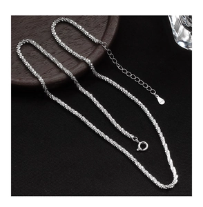 Detailed view of shimmering S925 sterling silver chain with spring clasp and extension tag