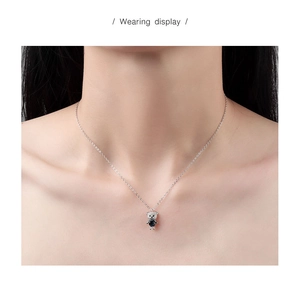 Wearing display of S925 sterling silver necklace with crystal bear pendant on model