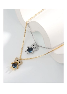 Close-up of S925 silver bear pendants with sparkling blue crystals and pave zircon details