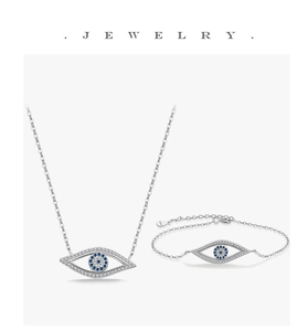 Detailed close-up of S925 sterling silver evil eye jewelry set with blue crystal accents