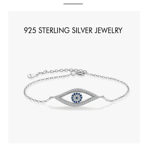Macro view of S925 sterling silver evil eye bracelet with blue crystal and white stones