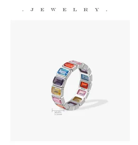 Detail shot of 5.5mm wide S925 silver ring featuring colorful baguette-cut gemstones
